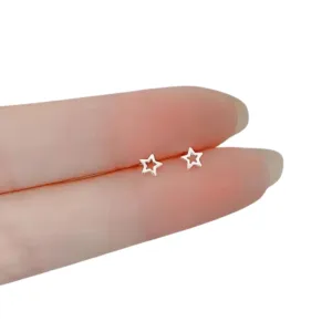 Dainty star earring. Silver colored. Minimalist star stud earrings. Girl gift idea.